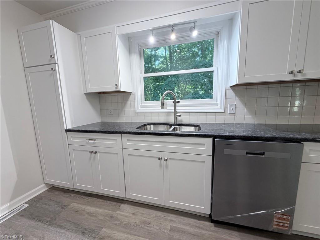 Kitchen sink, counters, and new appliances